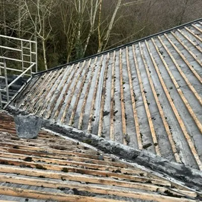 Old slates stripped off back to the original battens, Global Roofing and Guttering, Dublin